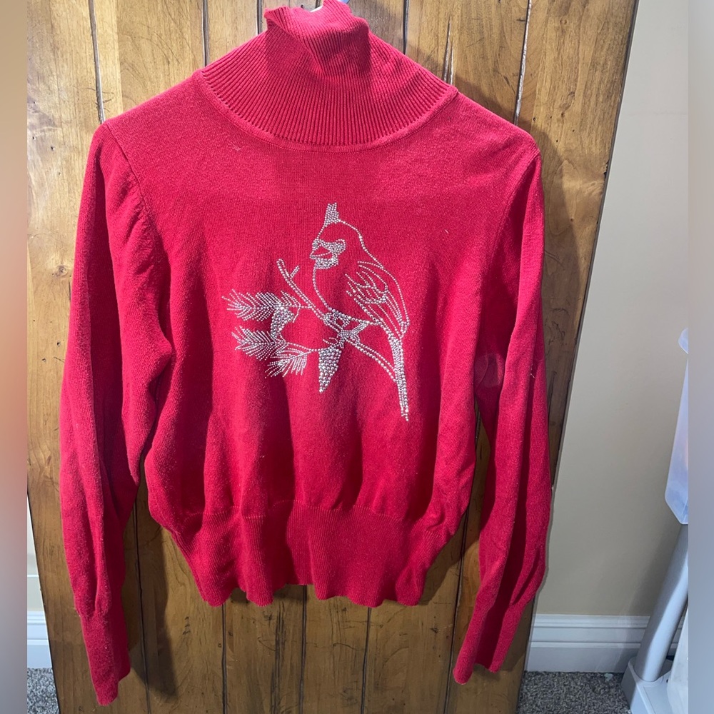 Red turtle neck long sleeve beeted bird